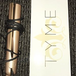 Tyme iron, used for straightening and curling!